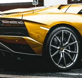 Yellow Lamborghini wheel – sports car rental Dubai